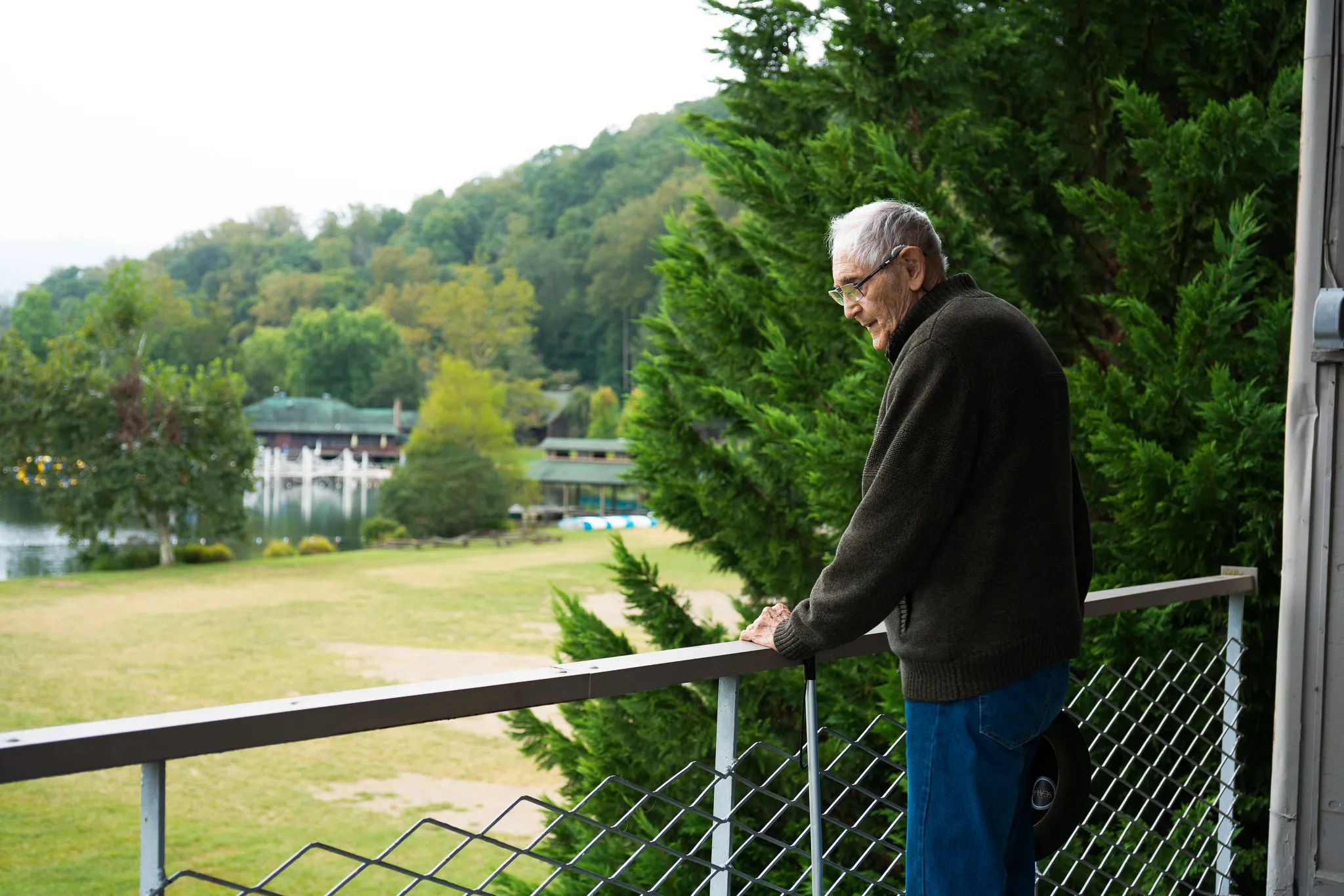 Frank Hursh standing on the balcony of the old studies building of Black Mountain College.